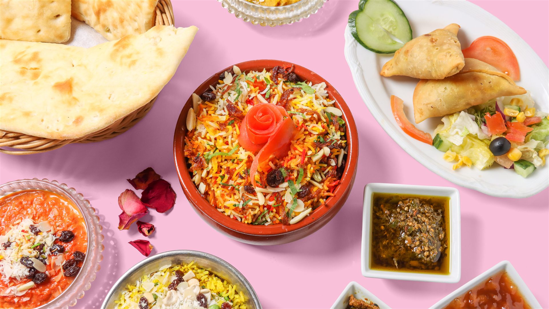 Tandoori Haus Spezialitäten mit Biryani, Naan und Samosas